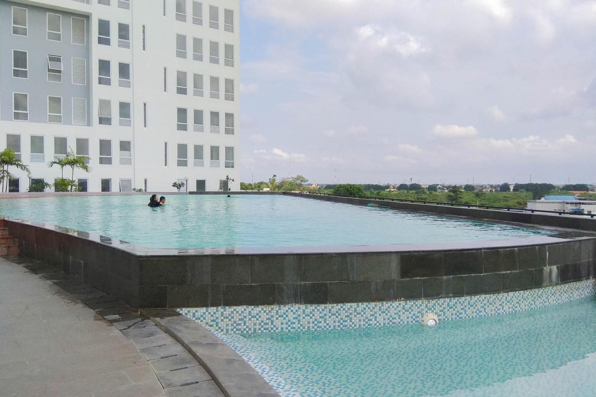 Modern And Comfy At Patraland Urbano By Travelio Apartemen *